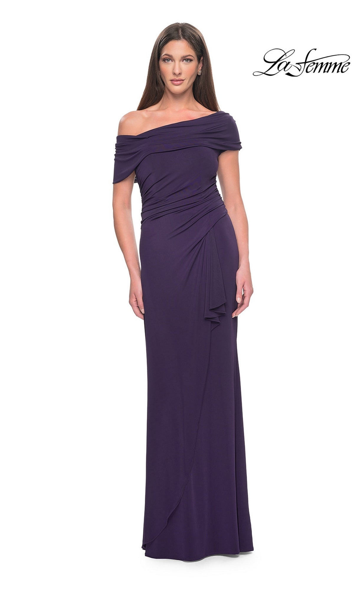 Woman wearing an eggplant La Femme 31459 floor-length evening gown featuring an off-the-shoulder neckline and ruched detailing at the waist.